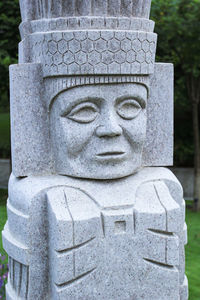 Close-up of statue in cemetery