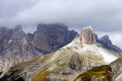 Rocky mountains against clouds