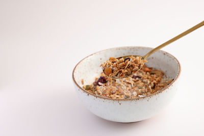 Close-up of food in bowl on white background