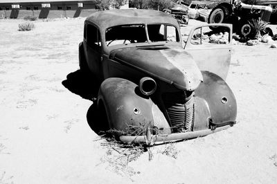 Close-up of abandoned car