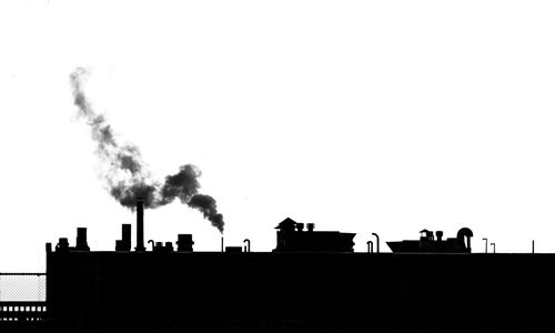 Silhouette of people against clear sky