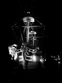 Low angle view of illuminated ferris wheel