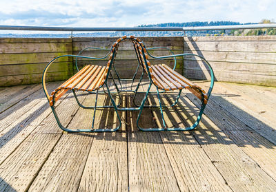 Curving benches near the water at gene coulon park in reonton, washington.