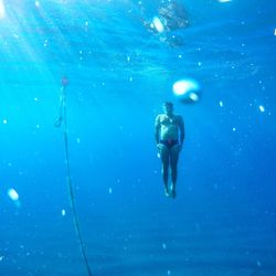 Man swimming in sea