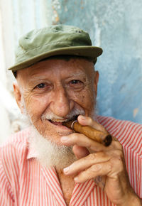 Portrait of senior man with cigar