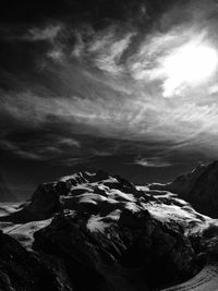 Scenic view of mountains against sky during winter