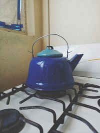 Close-up of blue chair at home