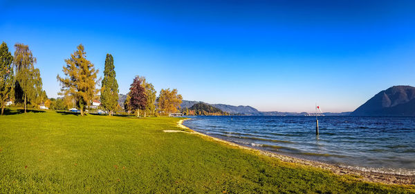 Scenic view of sea against clear blue sky