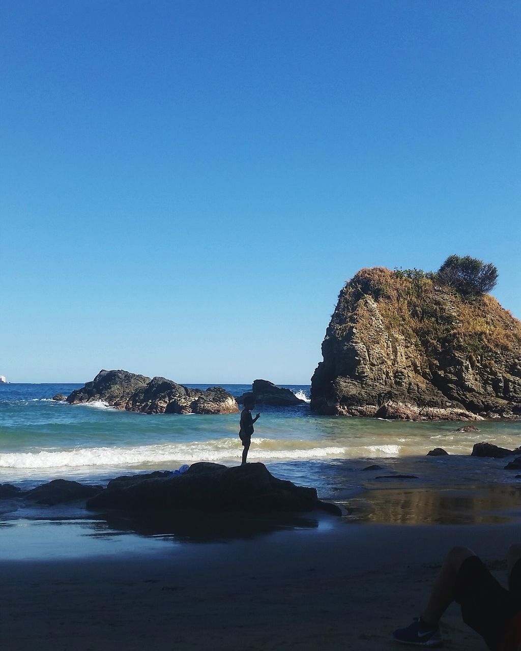 sea, nature, blue, beauty in nature, clear sky, beach, real people, idyllic, water, scenics, tranquility, one person, horizon over water, sky, tranquil scene, outdoors, day, people, adult, adults only