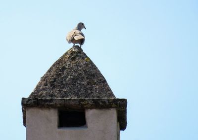Low angle view of traditional building against clear sky