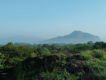 Scenic view of mountains against clear sky