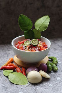 Close-up of fruits in bowl on table