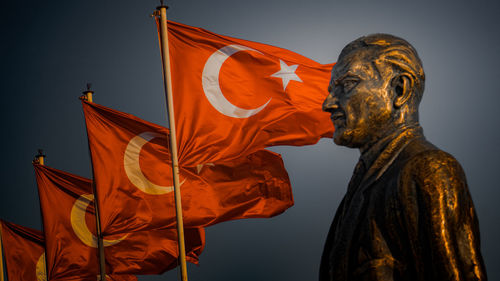 Low angle view of statue against sky