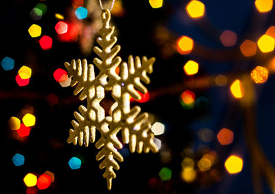 Close-up of illuminated christmas tree at night