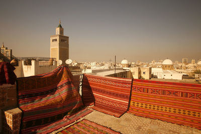 Panoramic view of buildings in city against clear sky