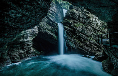 Scenic view of waterfall in forest