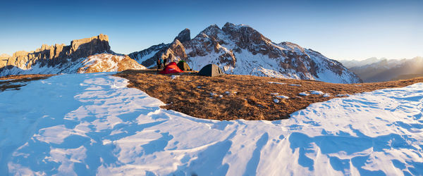 Panoramic view of snowcapped mountains against sky