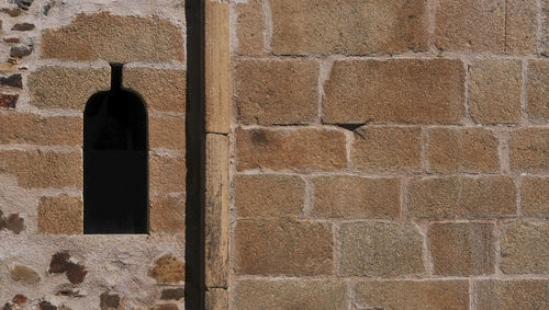 Window of a medieval building in caceres, spain