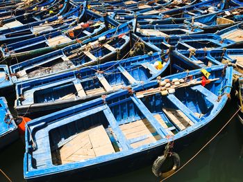 Boats moored in water