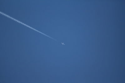 Vapor trail in blue sky