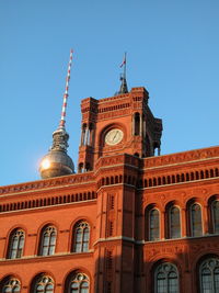 Low angle view of building against blue sky