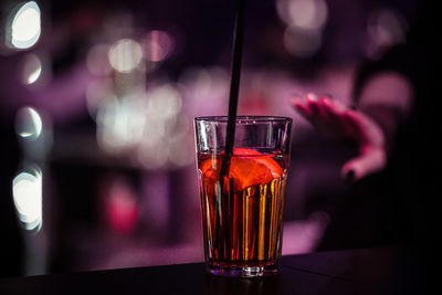 Close-up of wine in glass on table