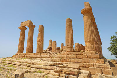 Old ruins of temple against clear sky