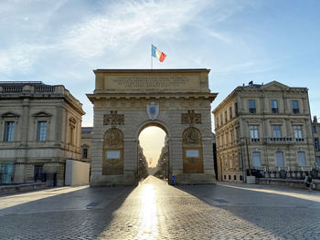 View of historic building against cloudy sky