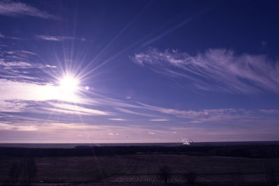 Scenic view of landscape at sunset