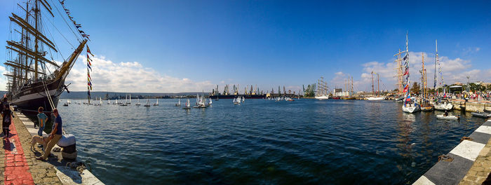 Boats moored at harbor