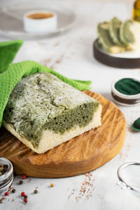 Homemade spirulina bread, gluten-free.  wooden board. superfoods. wellness and healthy vegeterian 