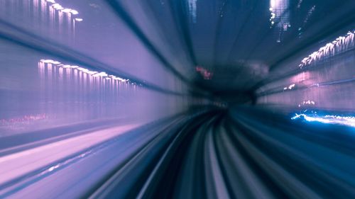 Blurred motion of illuminated tunnel