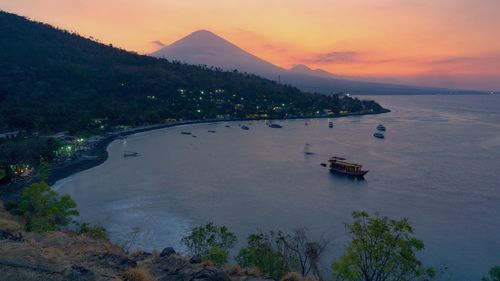 High angle view of sea against sky during sunset