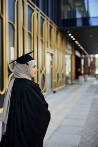 Woman wearing graduation hat