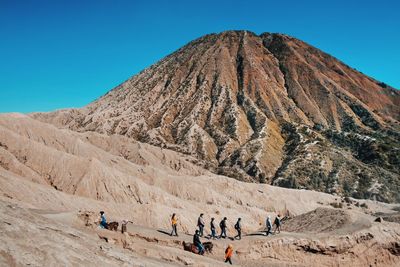 Scenic view of desert against clear sky