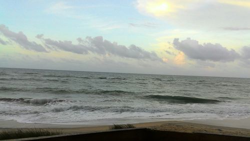 Scenic view of sea at sunset