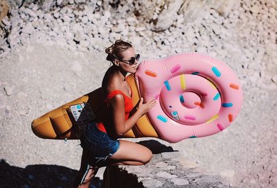 High angle view of woman on rock