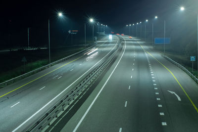 Light trails on road at night