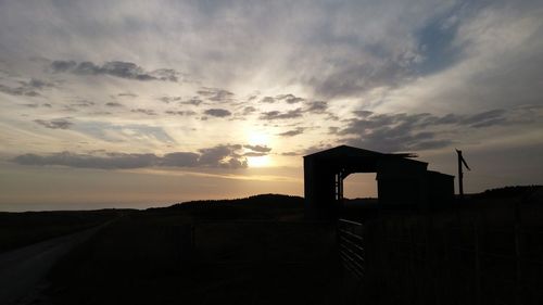 Scenic view of landscape at sunset