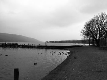 View of lake against cloudy sky