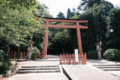 Entrance of temple against building