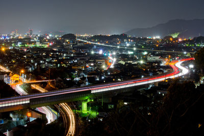 High angle view of illuminated city at night