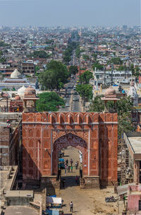 High angle view of buildings in city against sky