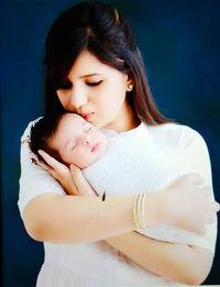 Portrait of mother and girl