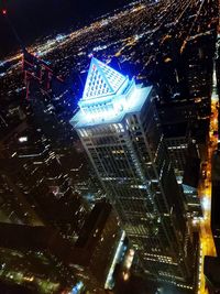 Low angle view of illuminated buildings at night