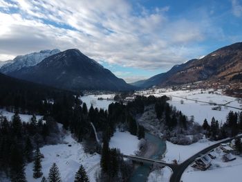 Scenic view of snowcapped mountains against sky