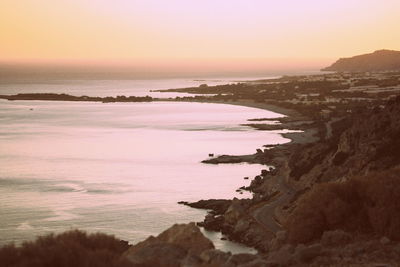 Scenic view of sea against sky at sunset