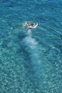 Man swimming in sea