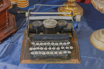 High angle view of clock on table