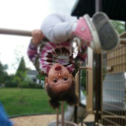 Close-up of boy looking at playground